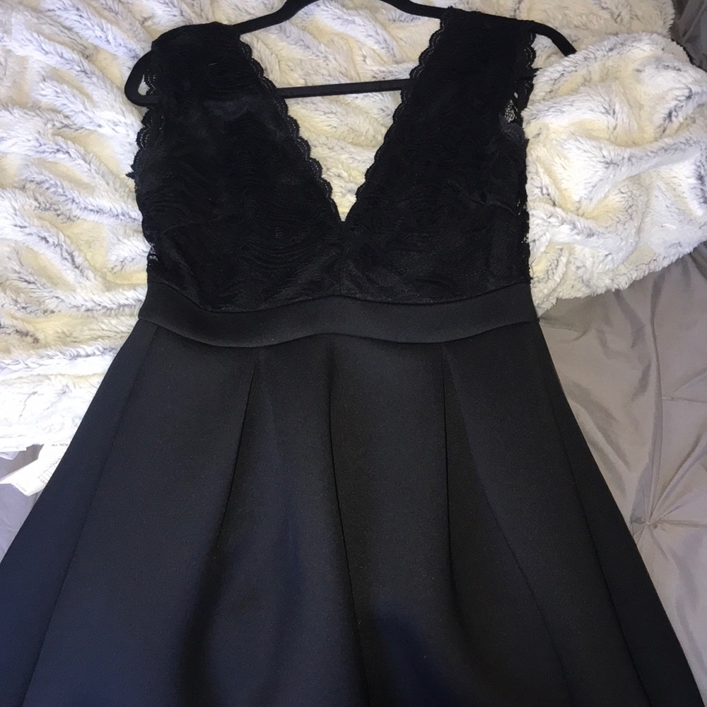 Black dress with lace v neck top